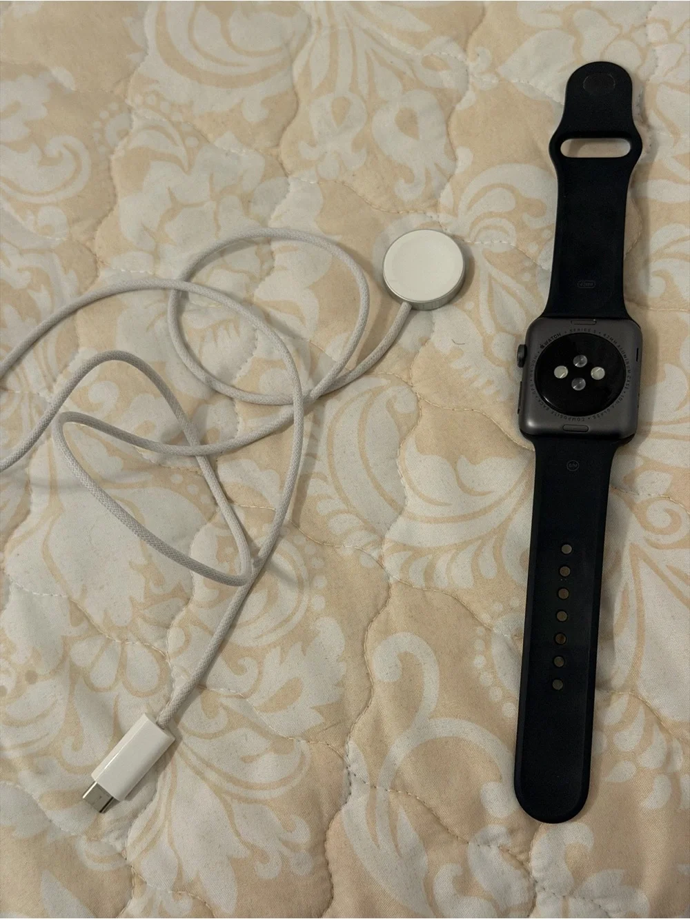 Apple Watch with black Silicone Band and Magnetic Charger. Used